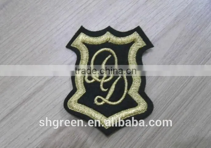 Uniform shoulder embroidery emblem with gold metallic thread