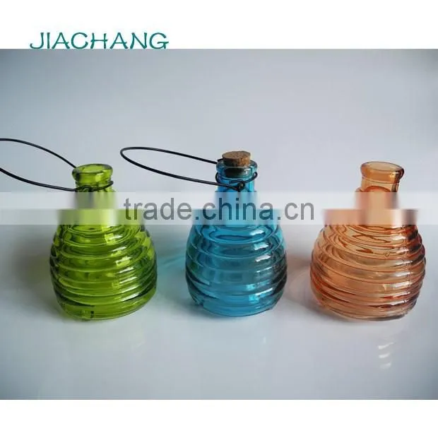 Colored glass bee catcher with handle