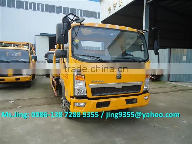 HOWO 3800mm wheelbase cheap wrecker tow truck, L5600*W2300 flatbed wrecker towing truck on sale in Africa