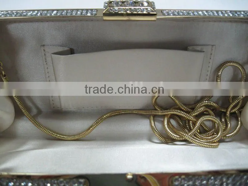 handmade stripy beaded clutch bag