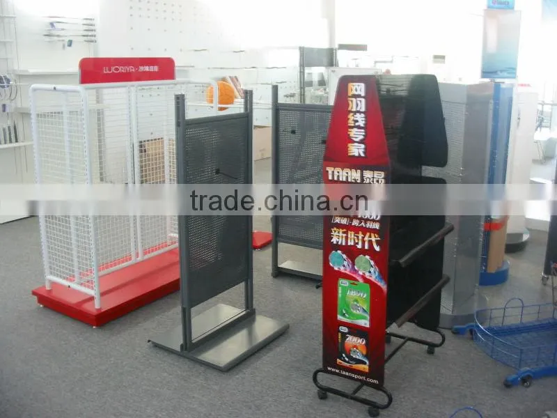 Double side wall display fixture with wheel