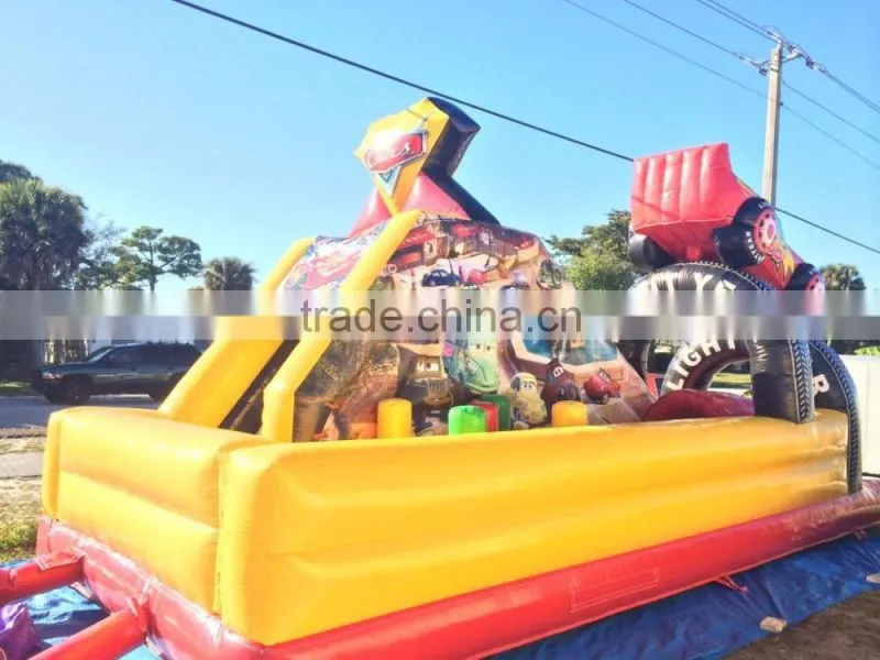 children play game inflatable slides with car obstacle for kids