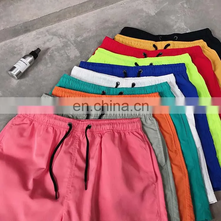 Wholesale Custom Logo Summer Beach Elastic Swimwear Quick Dry Mens Swim Shorts With Pocket