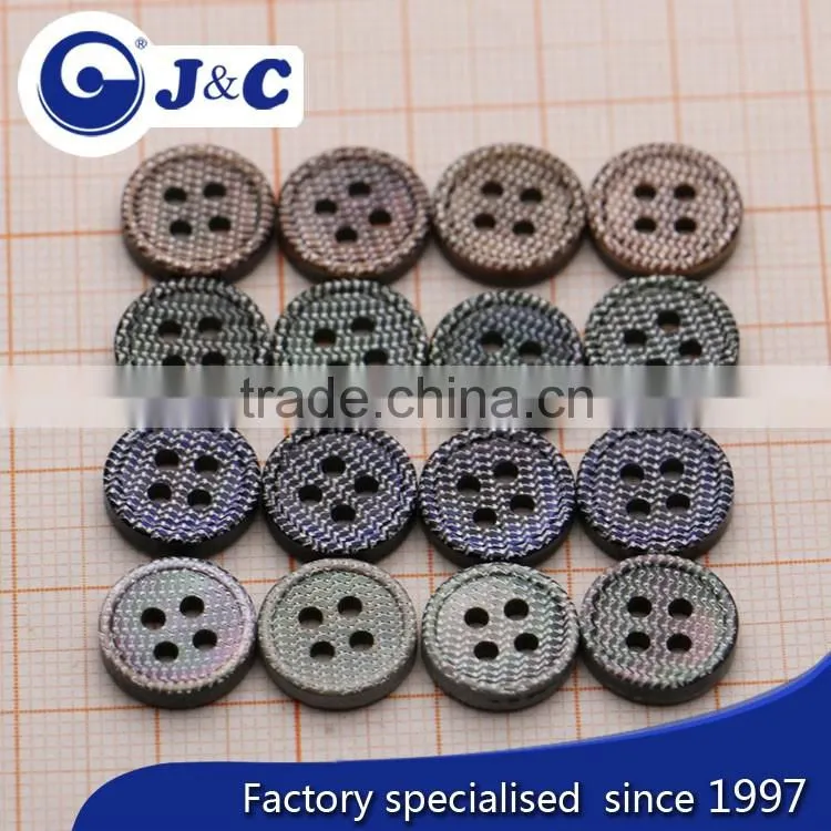 black natural shell buttons with engraved mark