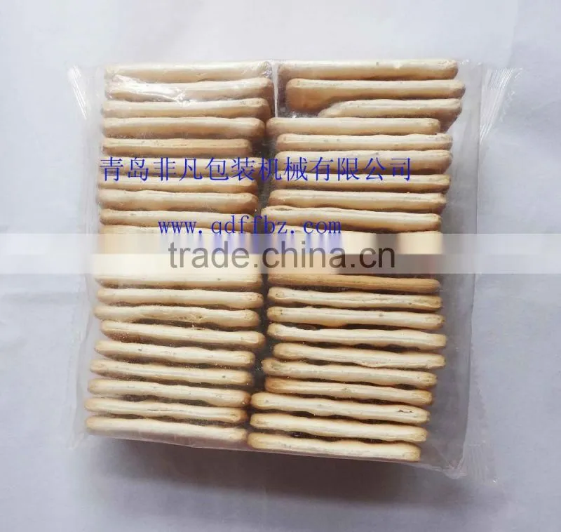 High speed envelope type biscuit packing/wrapping machine