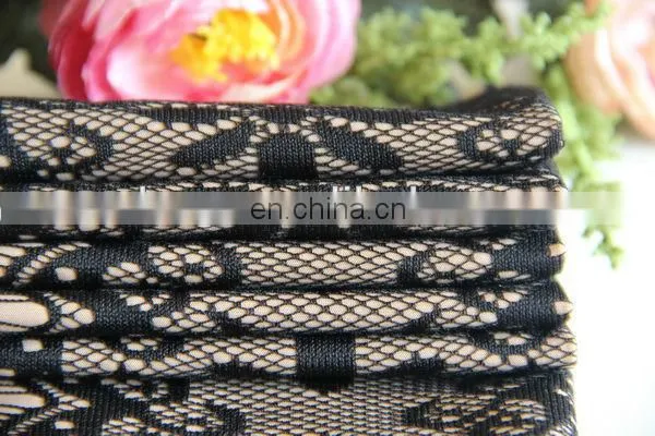 Knit polyester with flower pattern lace coated
