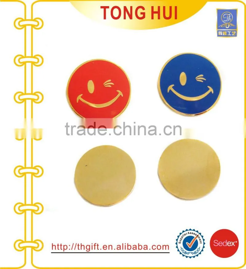 Metal badges with fan-shaped design