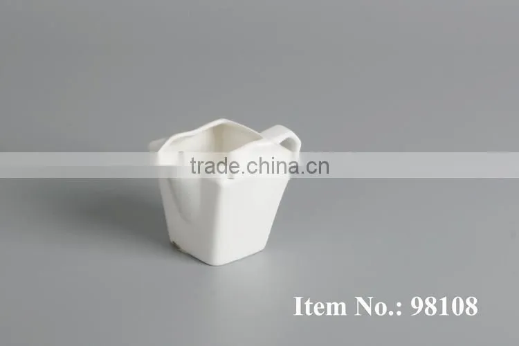 white ceramic drinkware milk creamer