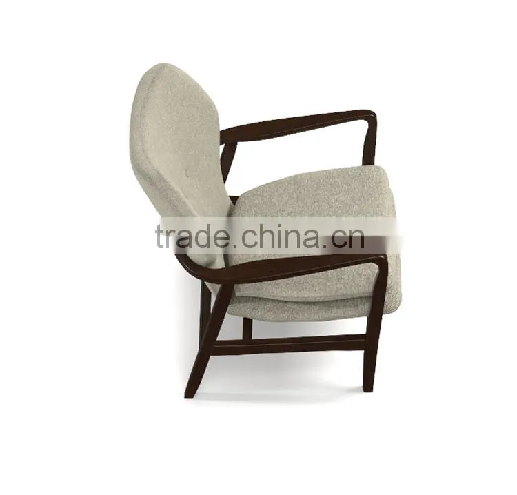 Mid-century walnut finished modern green fabric upholstered club chair with sleek polished wood arms