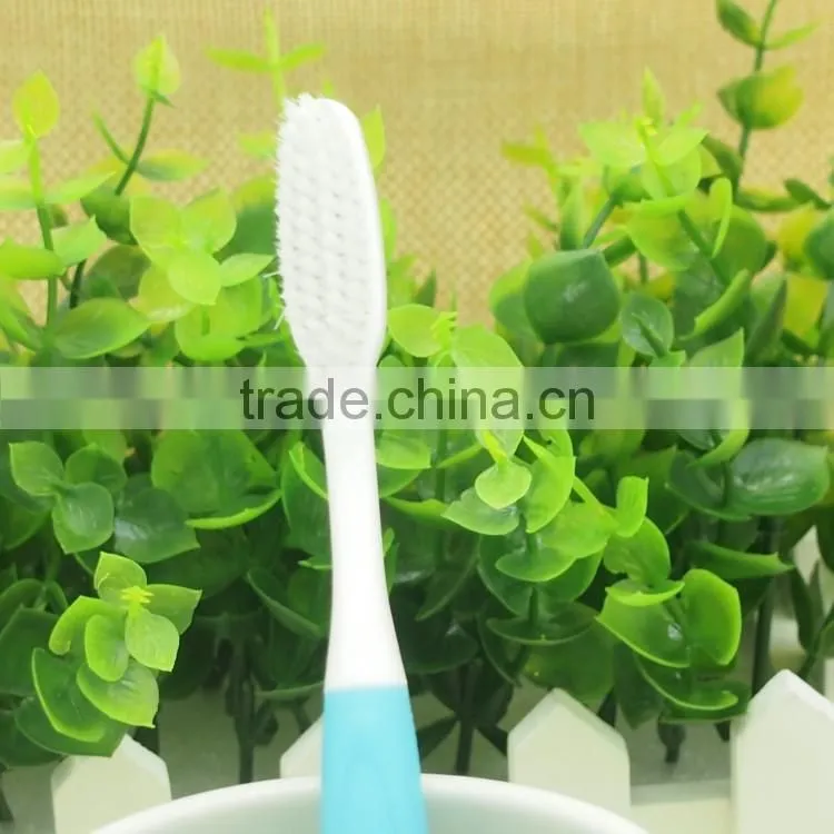 Dupont nylon rounded bristle Long rubber handle adult toothbrush