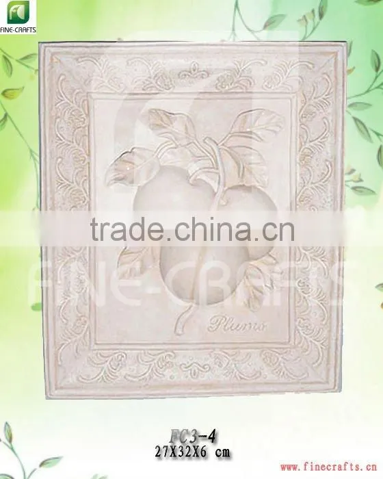 Polyresin wall decoration with plum