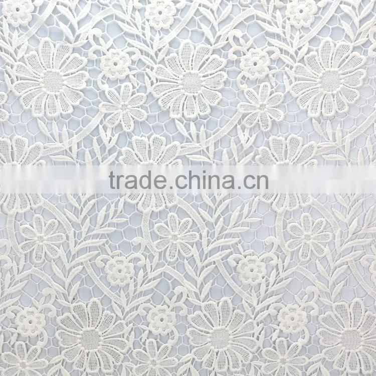 Hot sale promotional cheap embroidery supplies net dress materials fabric designs for clothes