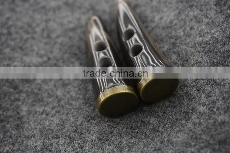 BRONZED METAL BOTTOM RESIN HORN button Fashion button