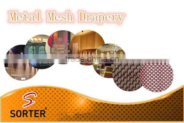 Sorter's curtain wall metal coil drapery