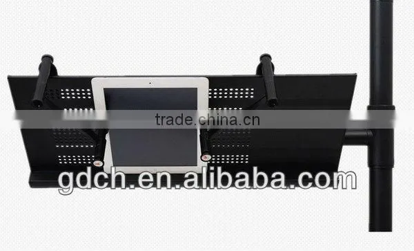 Portable folding notebook desk stand with mouse pad in bed