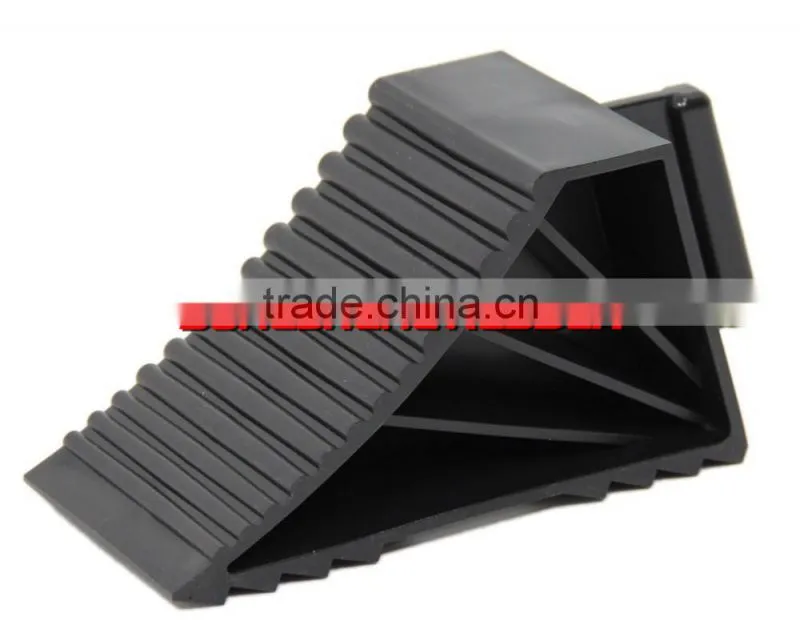 Automotive Wheel Chock with Pull Rope attached.