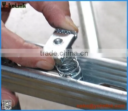 Channel nut with long spring for channel system