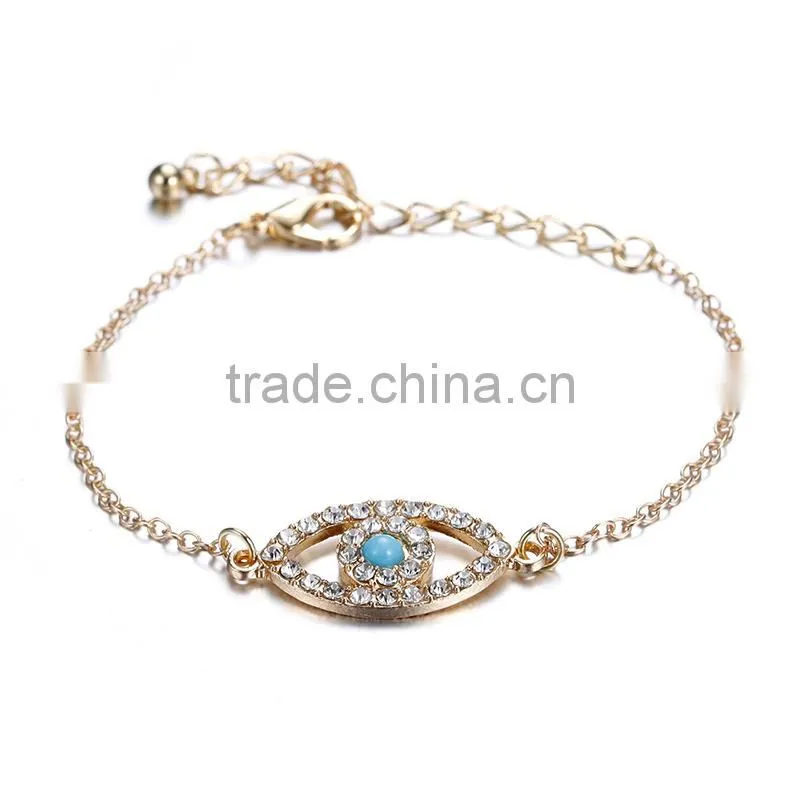 rhinestone evil eye charm gold chain bracelet