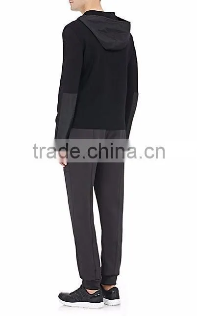 Black rib-knit virgin wool zip-front hoodie styled with tech-fabric elbow patches