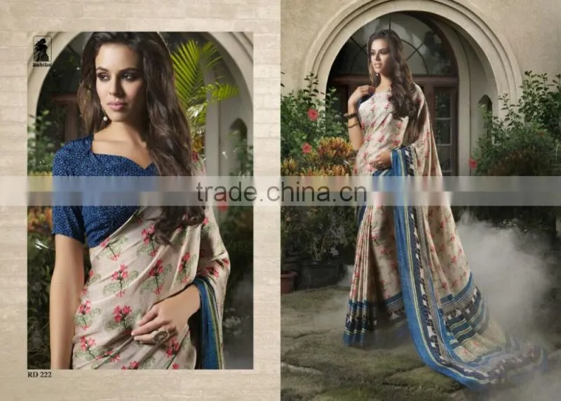 Zari Blouse and Orange color Womaniya Designer Sarees Collections