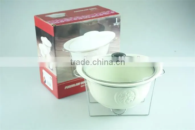 White ceramic soup tureen soup bowl with iron stand in stock