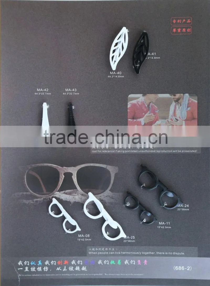 matt black key-shaped metal brooch for men