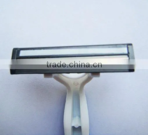 Twin blade disposable razor