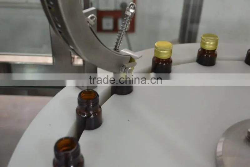 Automatic filling and capping machine