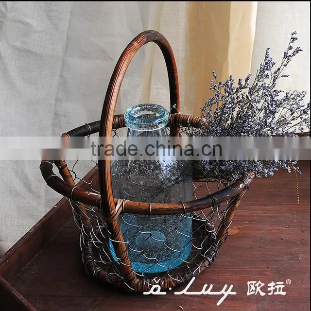 oval shape metal storage basket with long handle