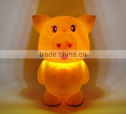 Supply fashion cartoon charging pig model table lamp