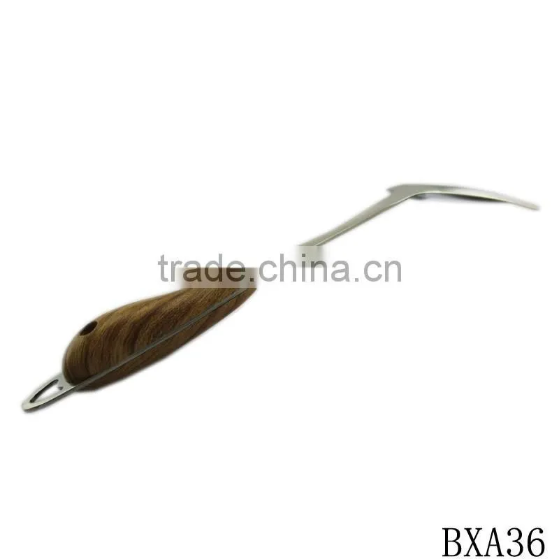 Professional stainless steel cooking spatula with wood handle