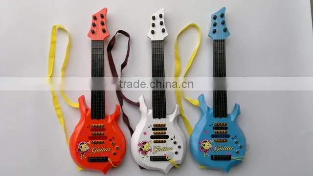 miniature toy guitar