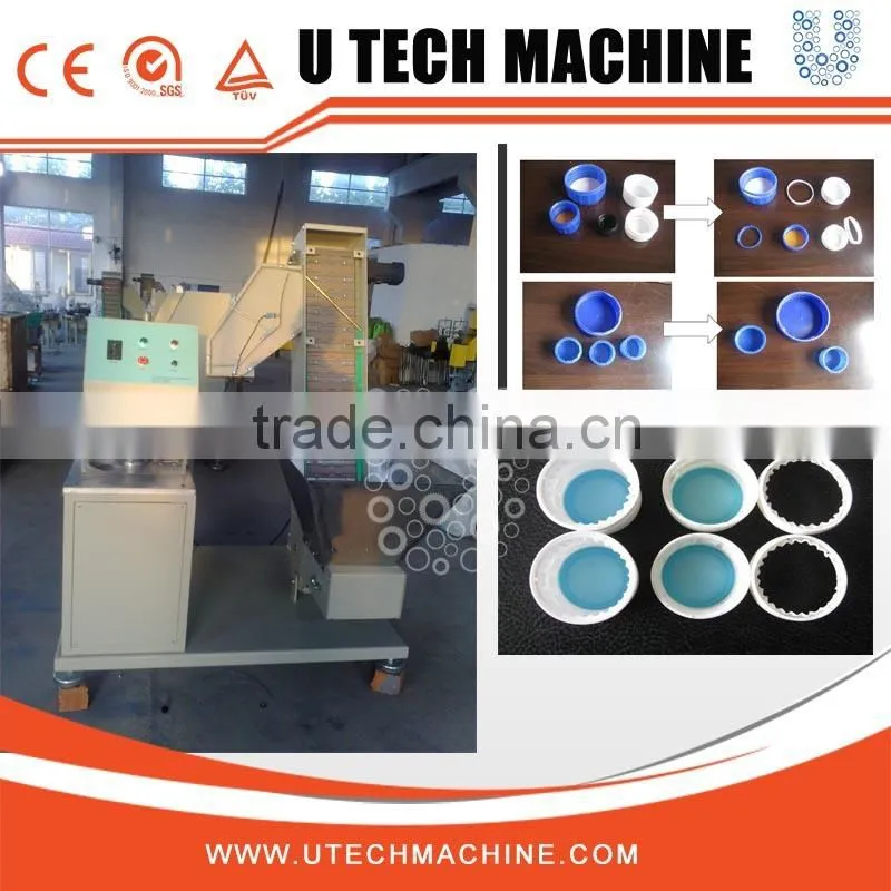 Cap slitting machine for chemical bottle cap