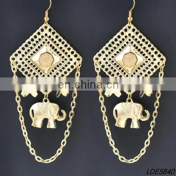 gold ring with elephant earring