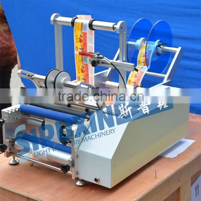 Sipuxin_Semi-automatic round bottle labeling machine