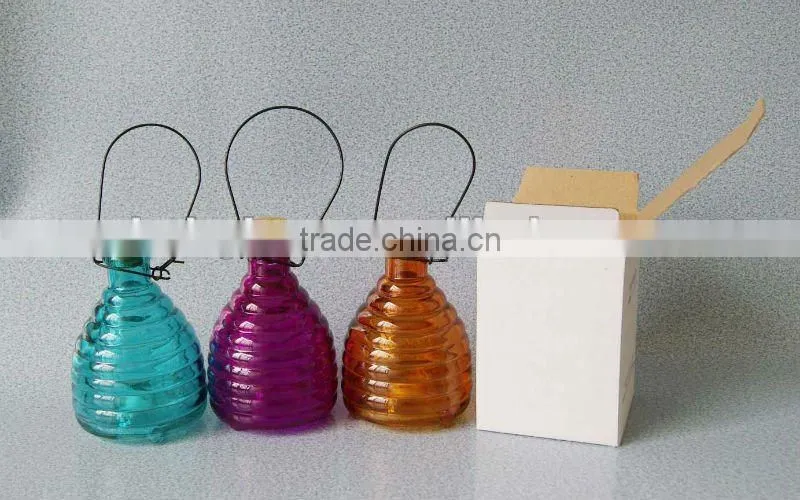 colored glass bee catcher with soft wood lid