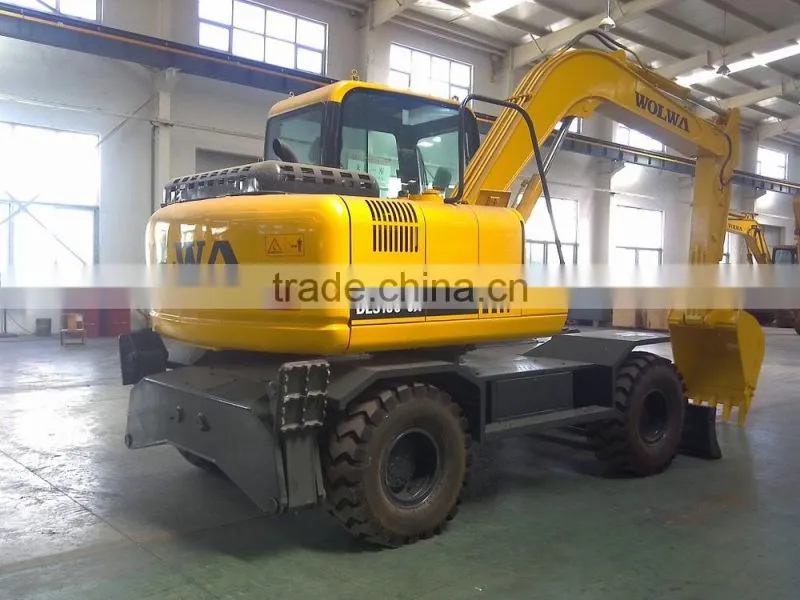 wheel excavator with front dump and back fixed leg