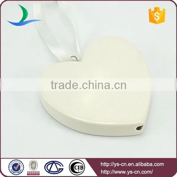 heart shape ceramic decoration with love relief