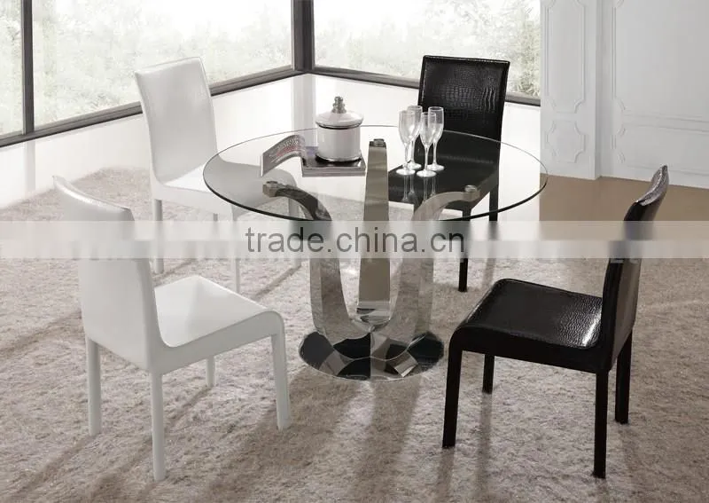 simple design dining table with clear glass top