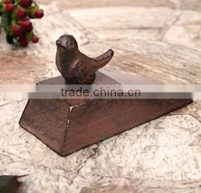 The cast iron mouse door stop