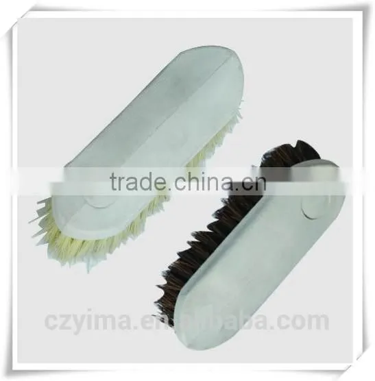 Plastic backed horse grooming brush for cleaning