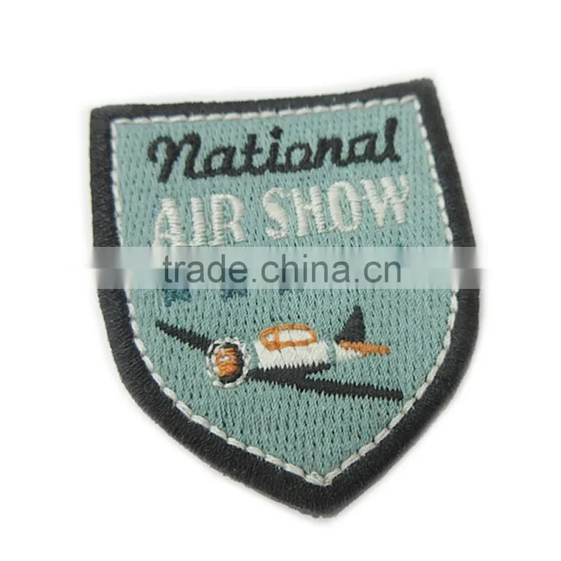 China Custom Logo Unique Felt Embroidery PU Badge