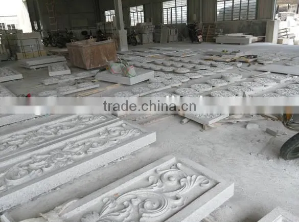 carved stone wall decoration