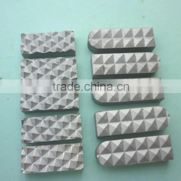 carbide replacement inserts for chuck jaws in diamond drilling