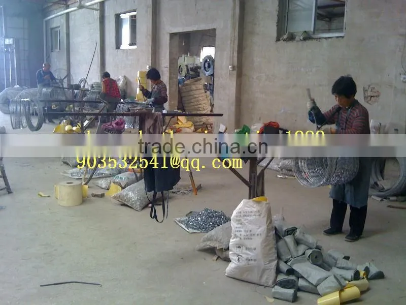 CBT 65 razor wire factory hot dipped galvanzied razor wire fencing military concertina wire