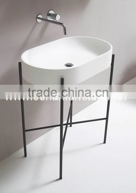 One piece shaped Corian free standing basin