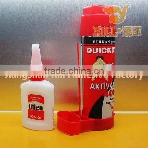 Spray activator adhesive