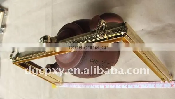 Gold plated leather bag frame