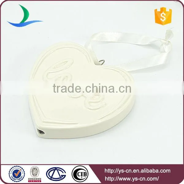 heart shape ceramic decoration with love relief