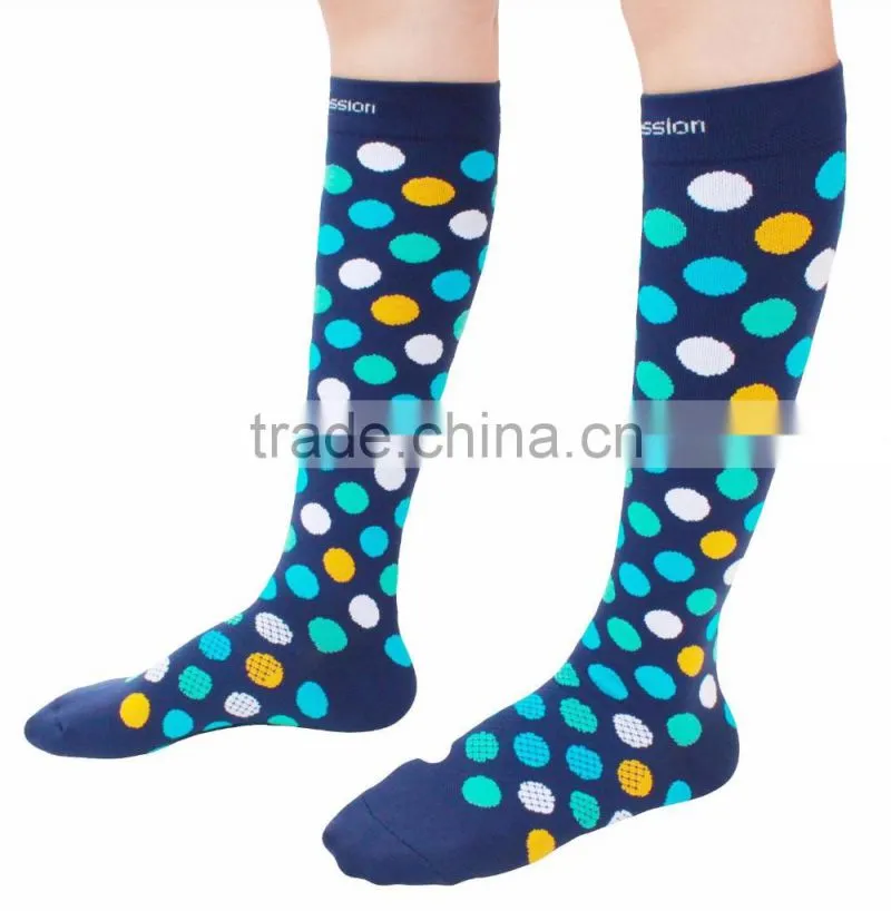 Compression Socks with polka dots made of nylon and spandex